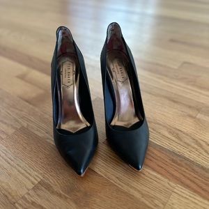 Black Ted Baker pumps with rose gold details